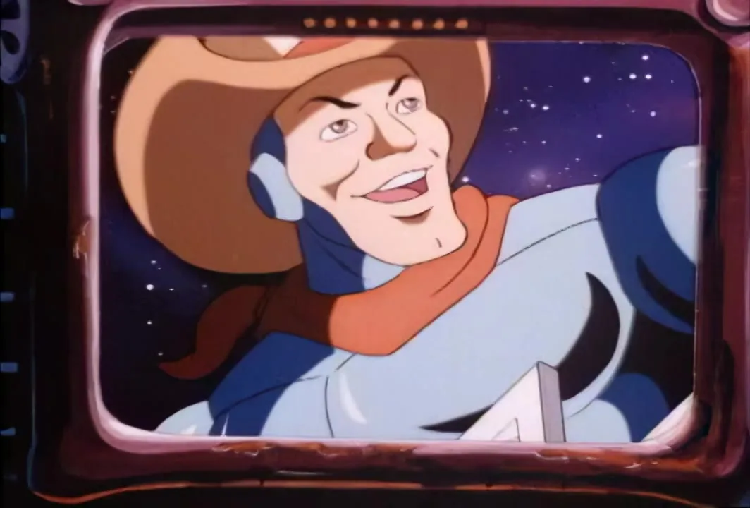 Bluegrass grins on the Mob's monitor as they watch him aim at the comet.