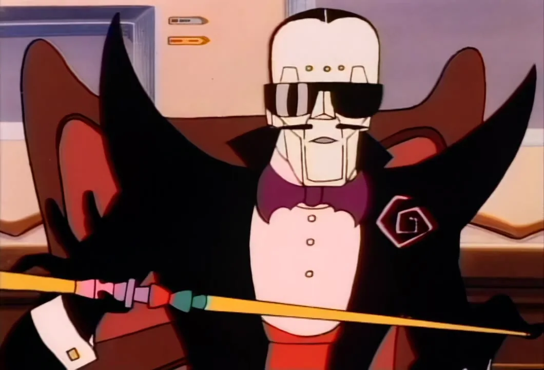 Poker-Face, cane in hand, has seen through Stargazer's disguise and orders Mumbo Jumbo to get him out.