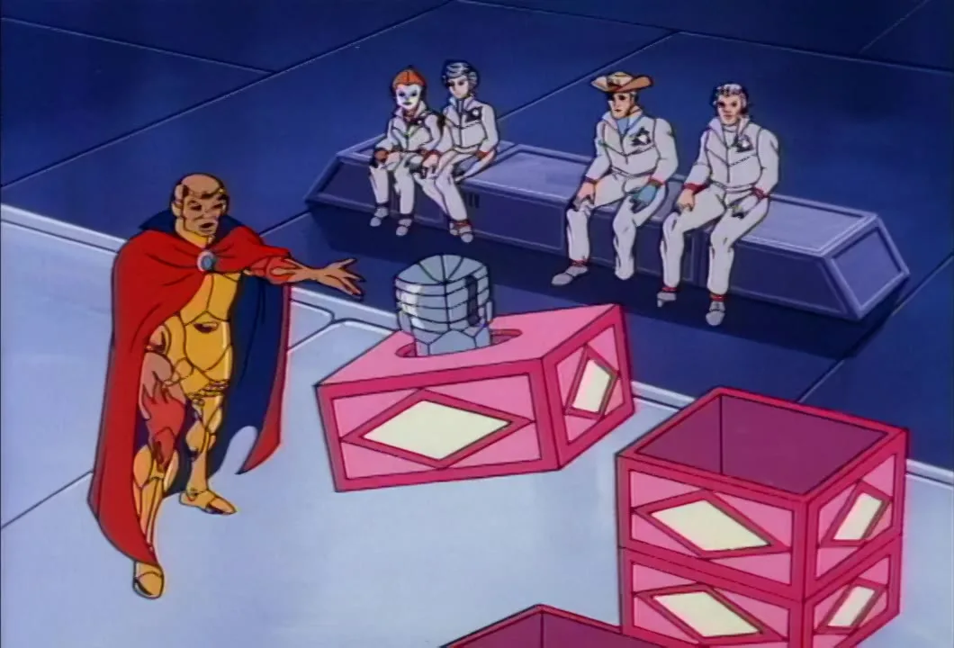 The SilverHawks watch from a bench as Steelwill's head sticks out of one of Hotwing's cabinet boxes.
